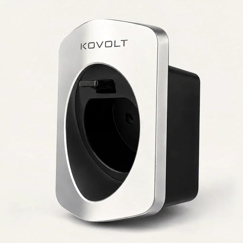 The Kovolt Mount, a silver and black wall-mounted holder for a Type 2 charging cable.